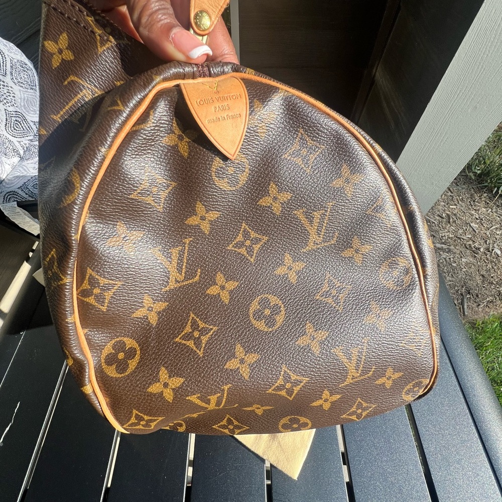 Louis Vuitton Monogram Brown Monogram Speedy 35..like new, dust bag and lock key